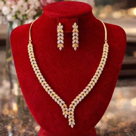 Elegant Gold Leaf Necklace Set with Matching Earrings
