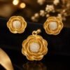 Rose-Inspired pendent and earrings designed by Isabel jewels